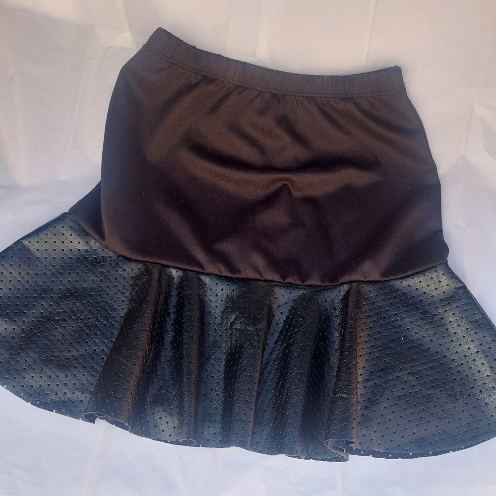 MARU black mini peplum skirt size small